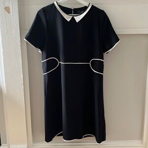 Cotelac black dress/white collar and piping.